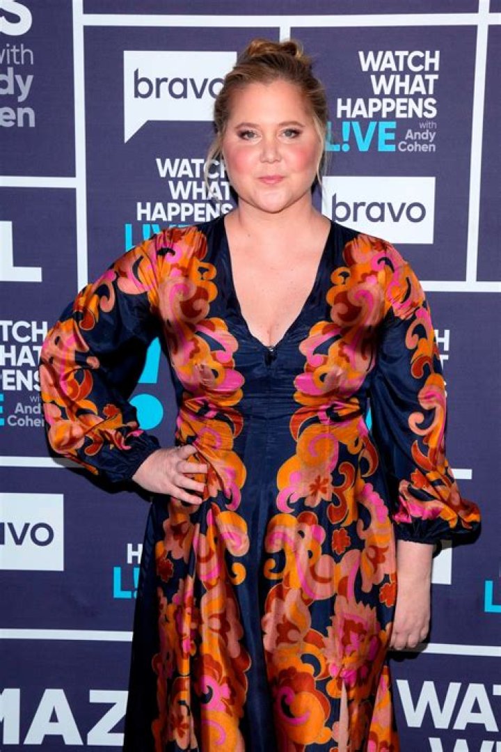 Amy Schumer in a patterned coat