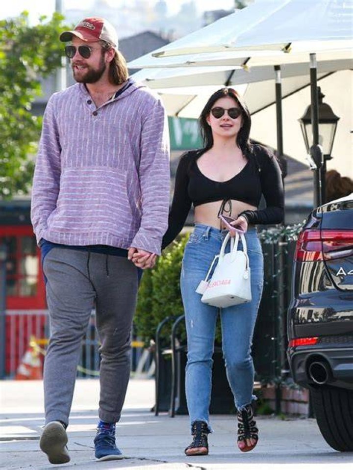 Ariel Winter holds hands with Luke Benward